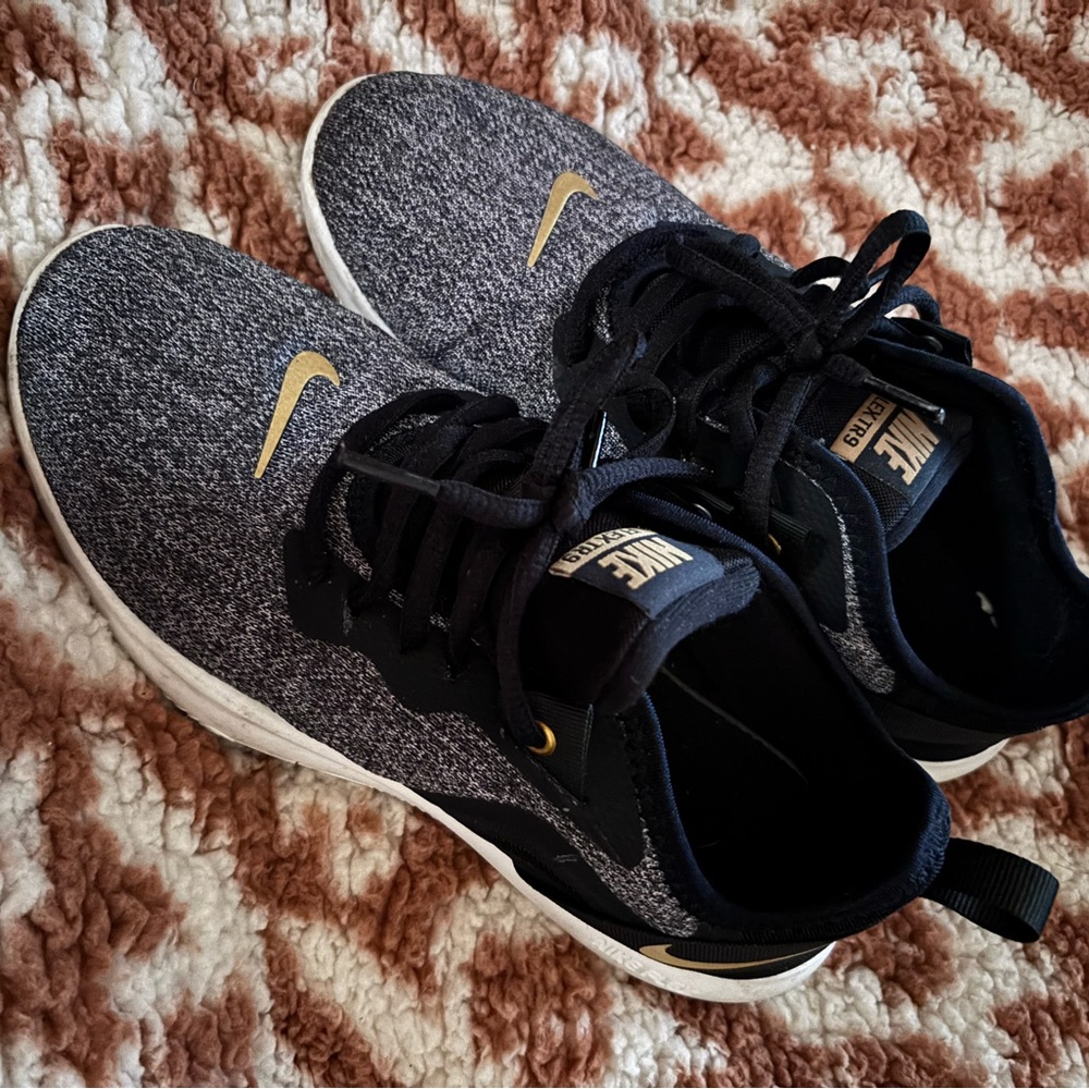 Nike Women’s Black and Gold Sneakers